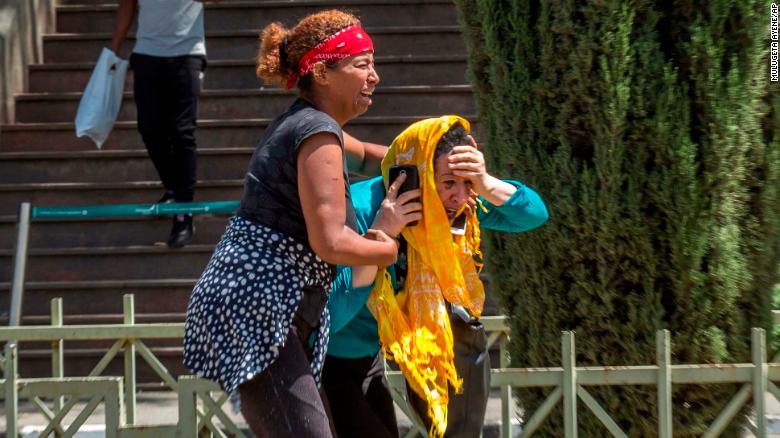 Family members of the victims react to news of the tragedy at Addis Ababa airport on Sunday.