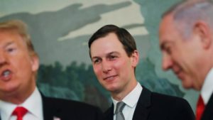 Kushner, centre, Trump's son-in-law, is said to be the main architect of a proposed $50bn economic plan [File: Carlos Barria/Reuters]