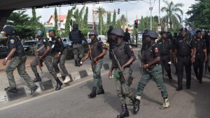 Cop Kills Man As Mob Attempts To Burn Police Station In Lagos